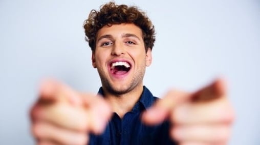 smiling_man_pointing