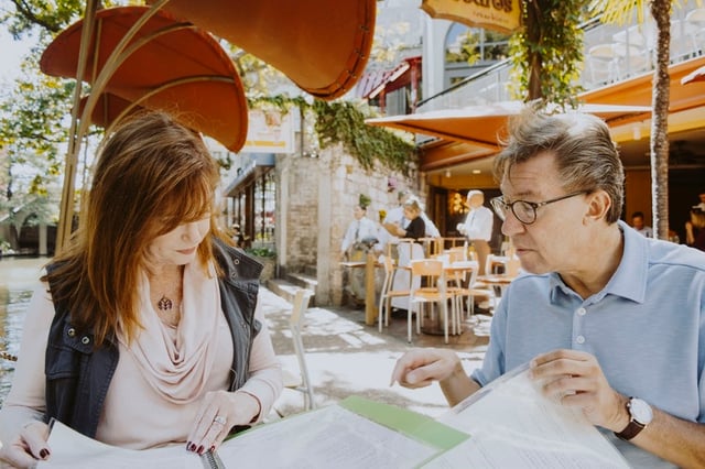 Stock photo of two people conducting research.